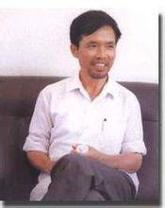 黎东明,1961年生于广西宾阳,1985年毕业于广西师范大学文学院并留校任