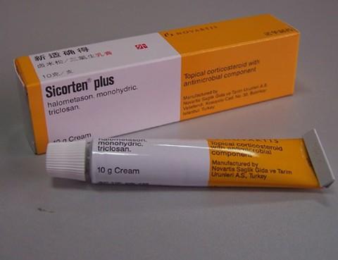 卤米松\/三氯生乳膏