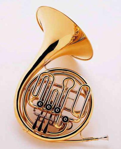 铜管乐器是一种将气流吹进嘴之后,造成嘴唇振动的乐器.