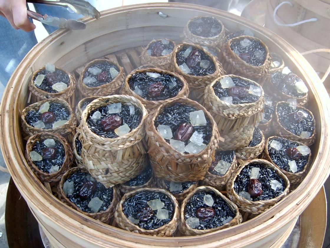 畲族乌米饭唐朝(公元669年)以来是畲族同胞"三月