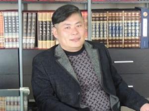 力冈