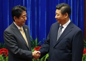 习近平与安倍晋三握手