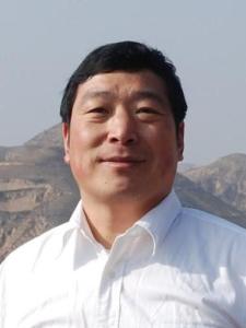 毛国典
