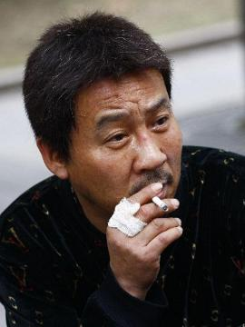 马少骅饰演谢长发