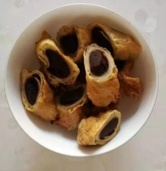 炸千子薰泥鳅薰泥鳅,为雄县龙湾镇地方小吃.